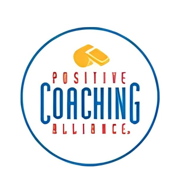 A white circle with the words positive coaching alliance written in it.